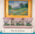 Three charming floral cachepots