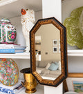 Vintage Octagonal Framed Mirror
Approximately 12″ H × 7″ W